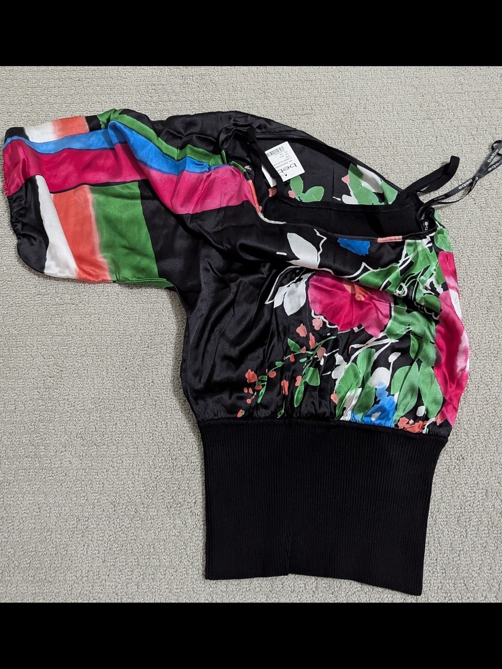 bebe Floral One-Shoulder Top in Black with Pink & Green Accents